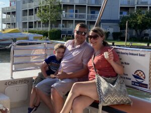 Family on the back of an ice cream cruise in OC MD