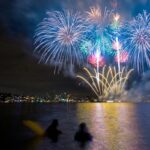 Fireworks in OC MD blueish in color with the light reflecting off the water. Photo is from a boat.