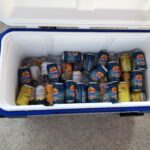 looking overhead of an open cooler full of drinks